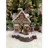 Játszó és mozgó mézeskalács házikó LED-del 23cm