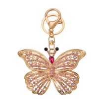   CLEEF.JZKC0176 Fém kulcstartó lepkés, üveggyönggyel, 6x2x8cm