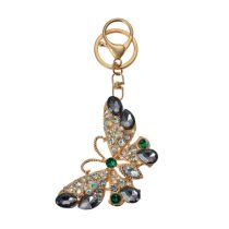  CLEEF.JZKC0191 Fém kulcstartó pillangós, üveggyönggyel, 5x1x8cm