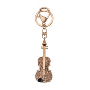 CLEEF.JZKC0126 Fém kulcstartó hegedűvel, arany színű üveggyönggyel